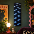 Navy cord fabric noticeboard with pale blue zig-zag ribbon. Holds memos, photos, notes and more. Handmade at home by me!