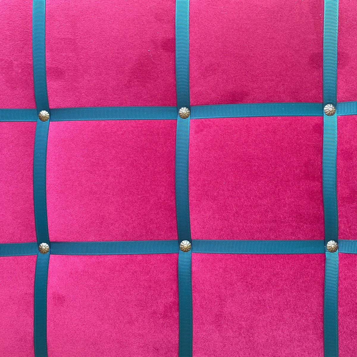 Magenta fabric noticeboard with teal ribbon in a modern square design. Holds memos, photos, notes and more. Handmade with local fabric.